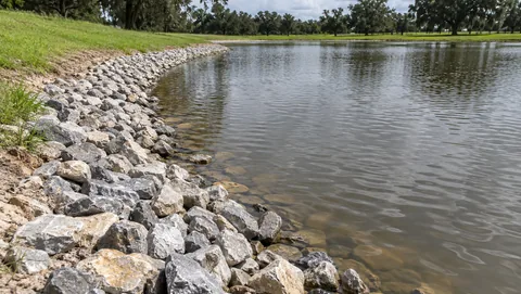 Riprap protecting a pond bank from erosion